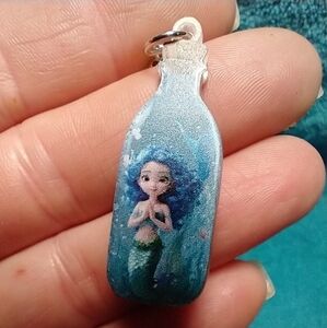 Cute mermaid in a bottle blue green wire earrings